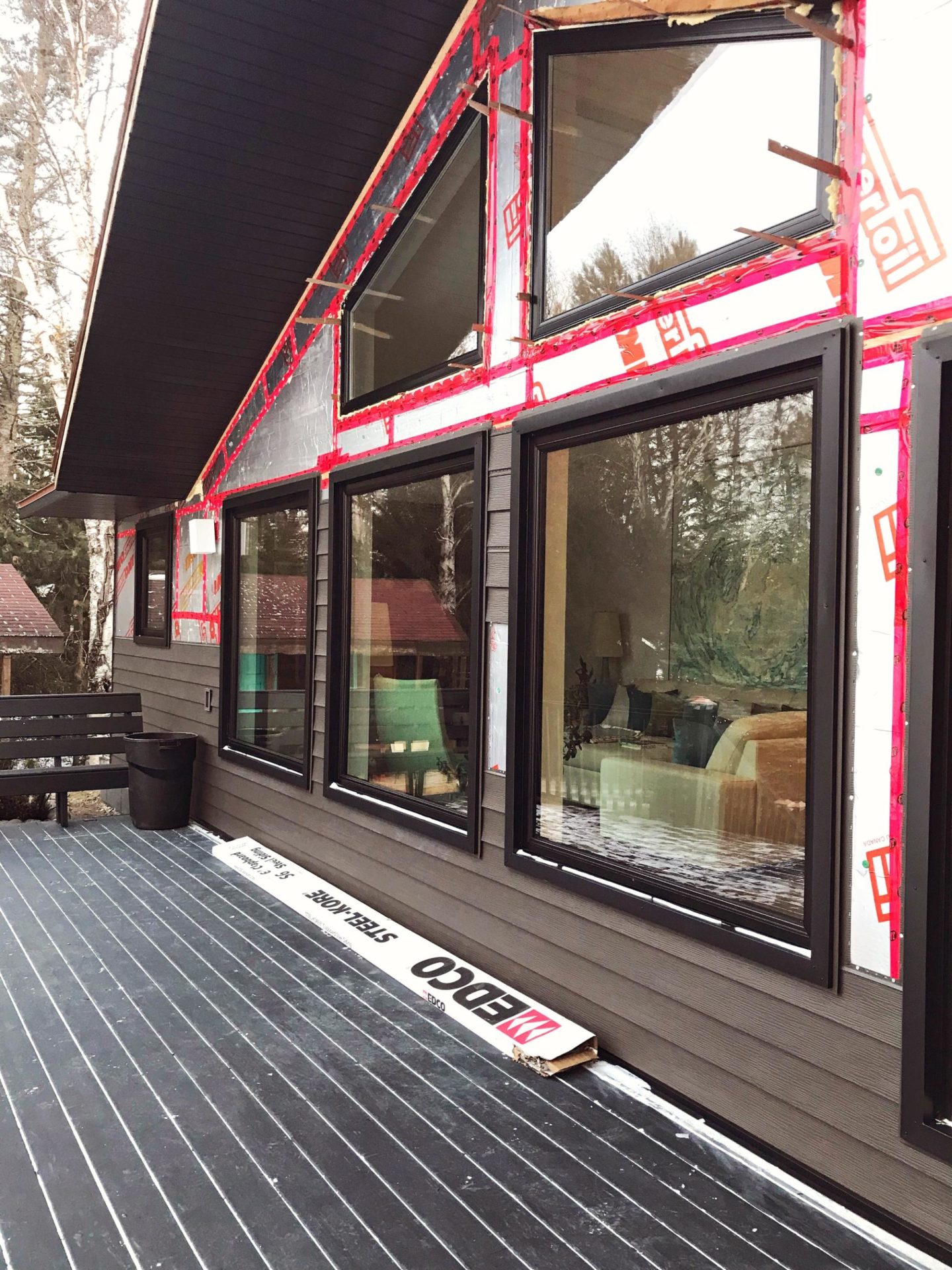 Olympic Black Deck Stain in Mystic Black and Veranda Copper Solar Deck Caps | Staining the Deck Black with Dans le Lakehouse