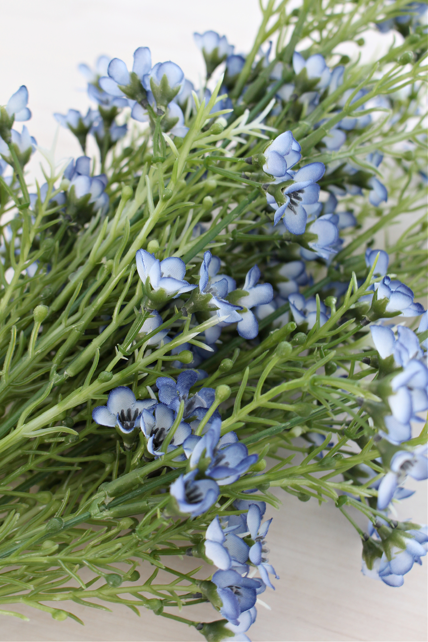 Add Faux Flowers to Branches for Spring Decor