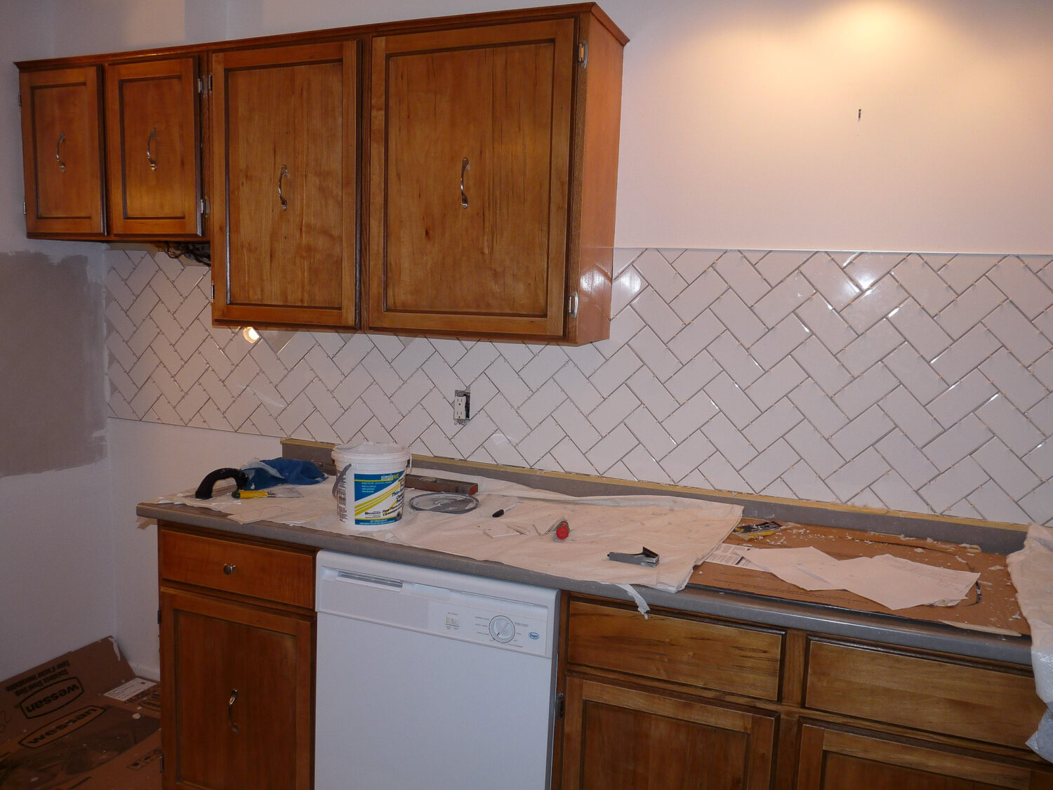 DIY Herringbone Style Subway Tile Backsplash