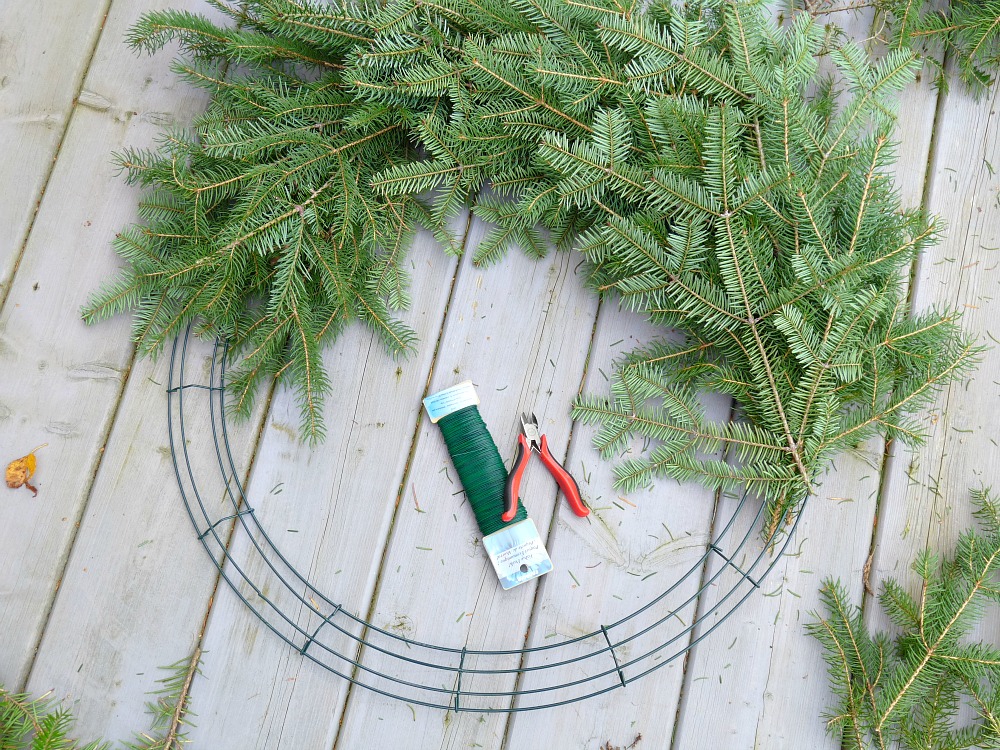 DIY Evergreen Wreath with Feathers + Faux Birds