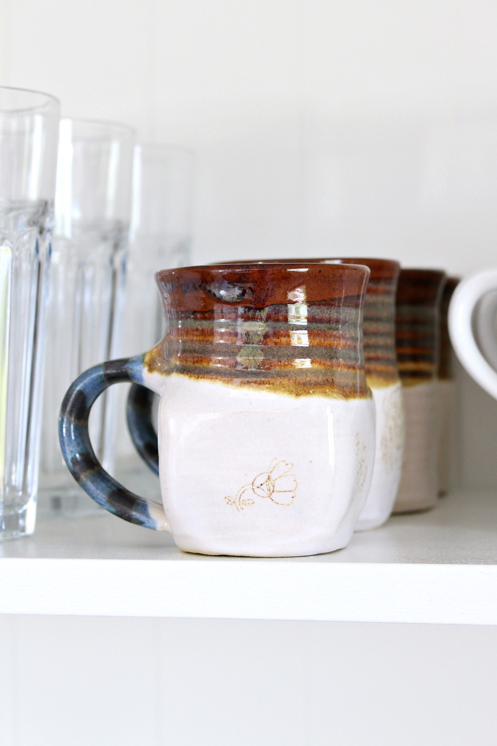 Brown and Blue Pottery Mugs