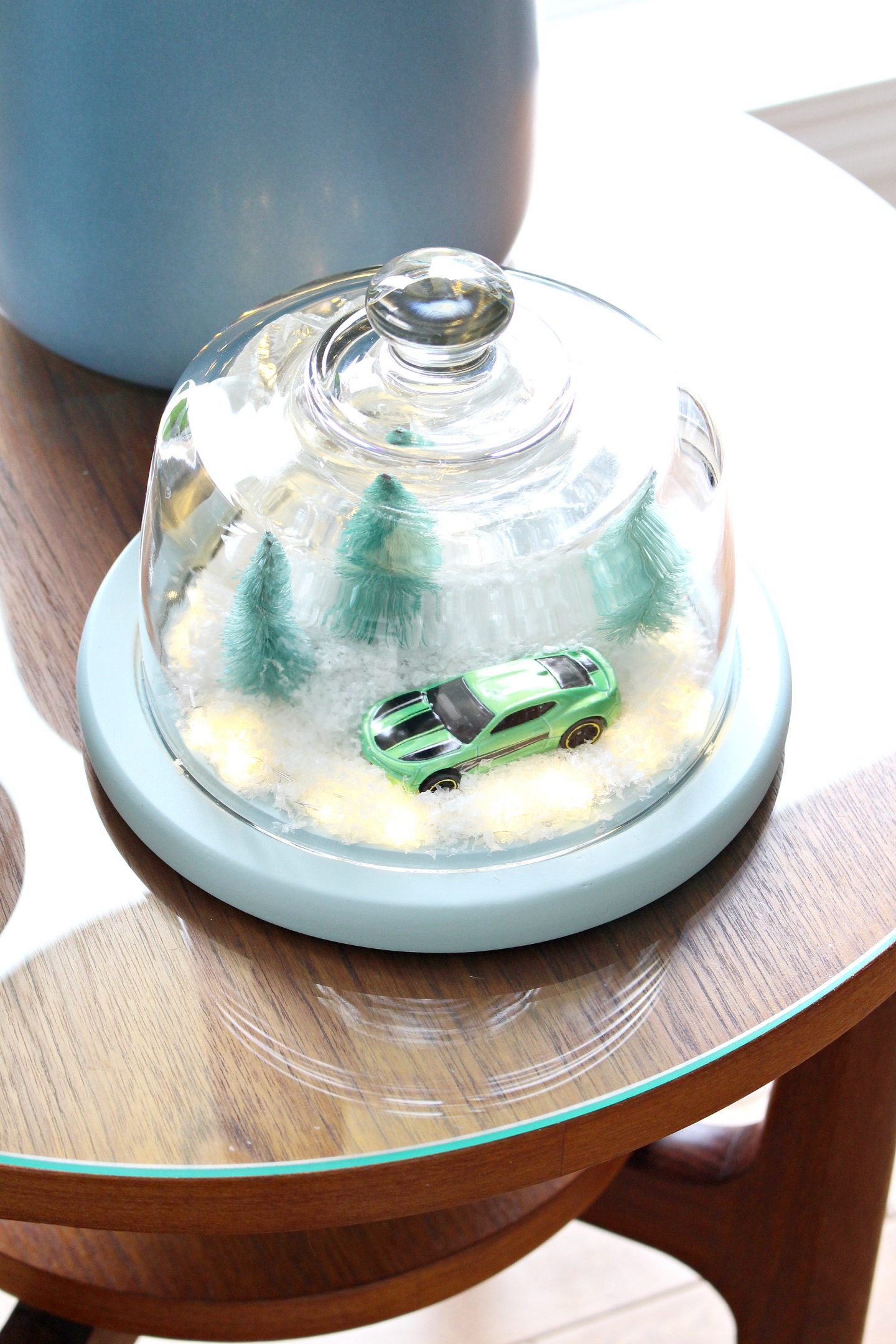 DIY Winter Diorama | aka The Camaro Cloche. Make this easy winter decor using a thrifted cheese cloche. A very Camaro christmas haha! #diy #holidaydecor 