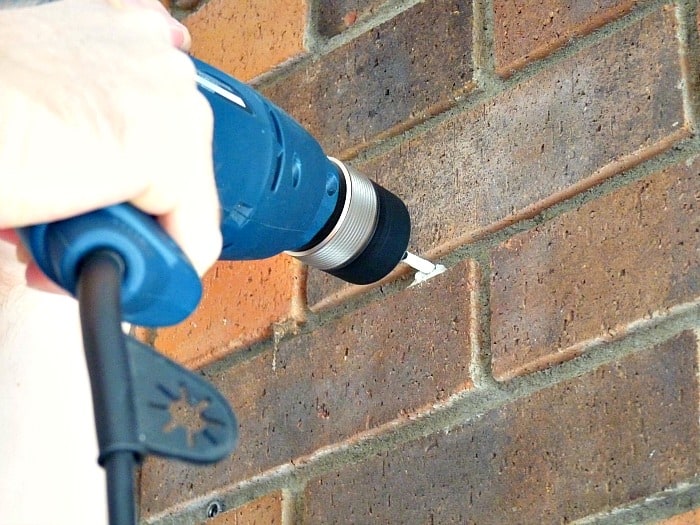 HOW TO HANG SOMETHING HEAVY ON BRICK