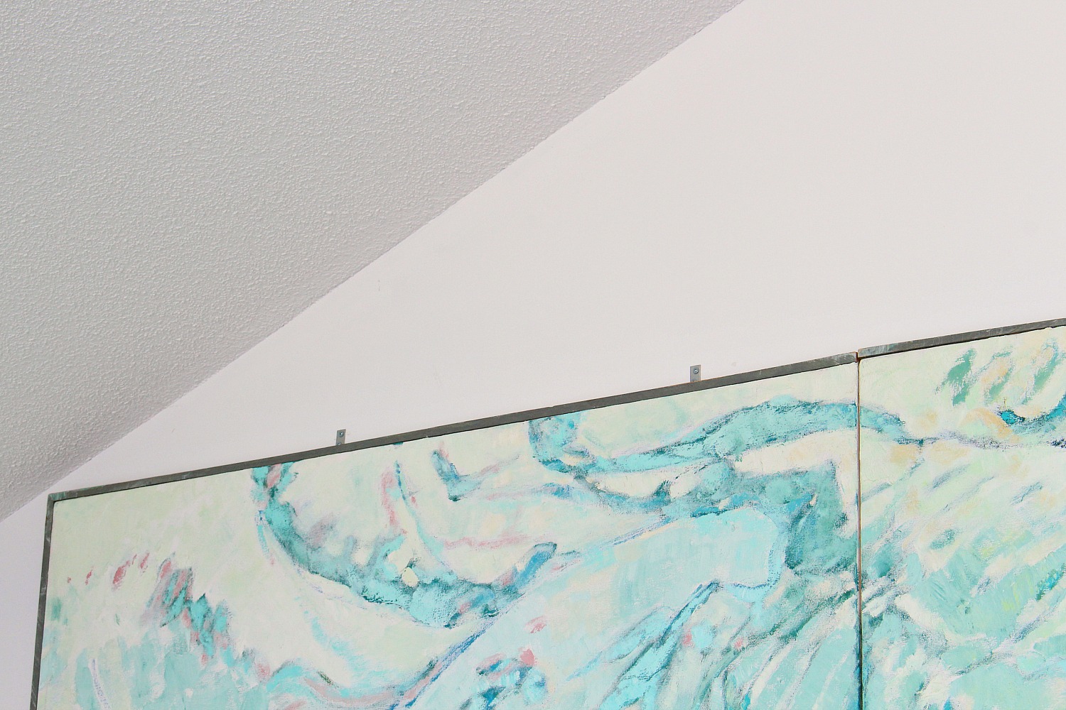 How to Hang Large Art + How to Put a Sofa in Front of Art Without