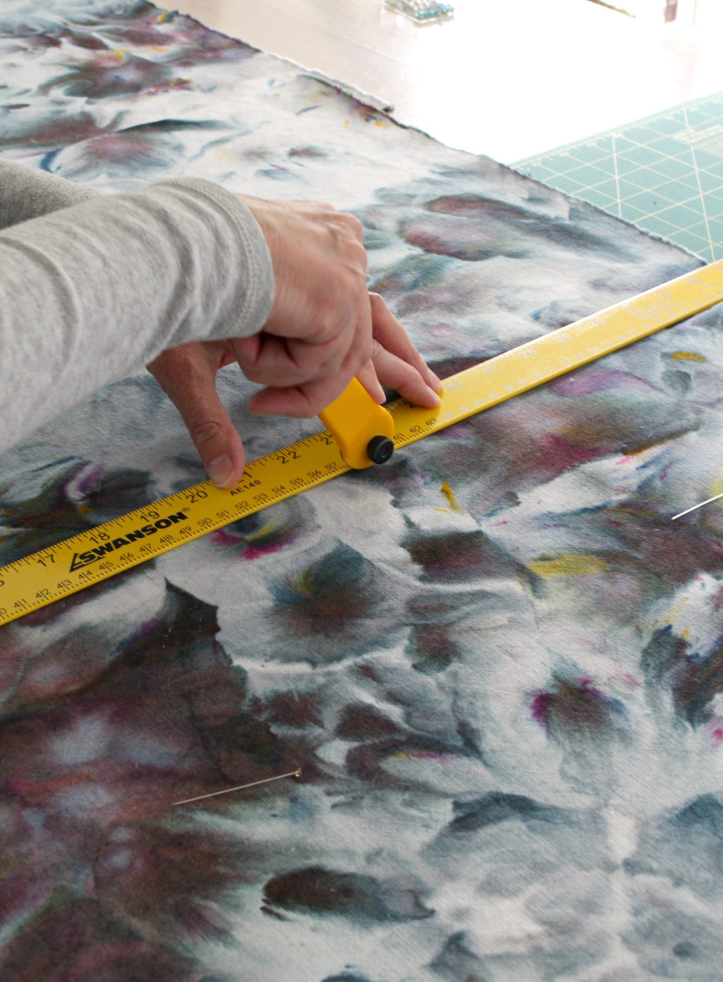 The trick to cutting fabric straight