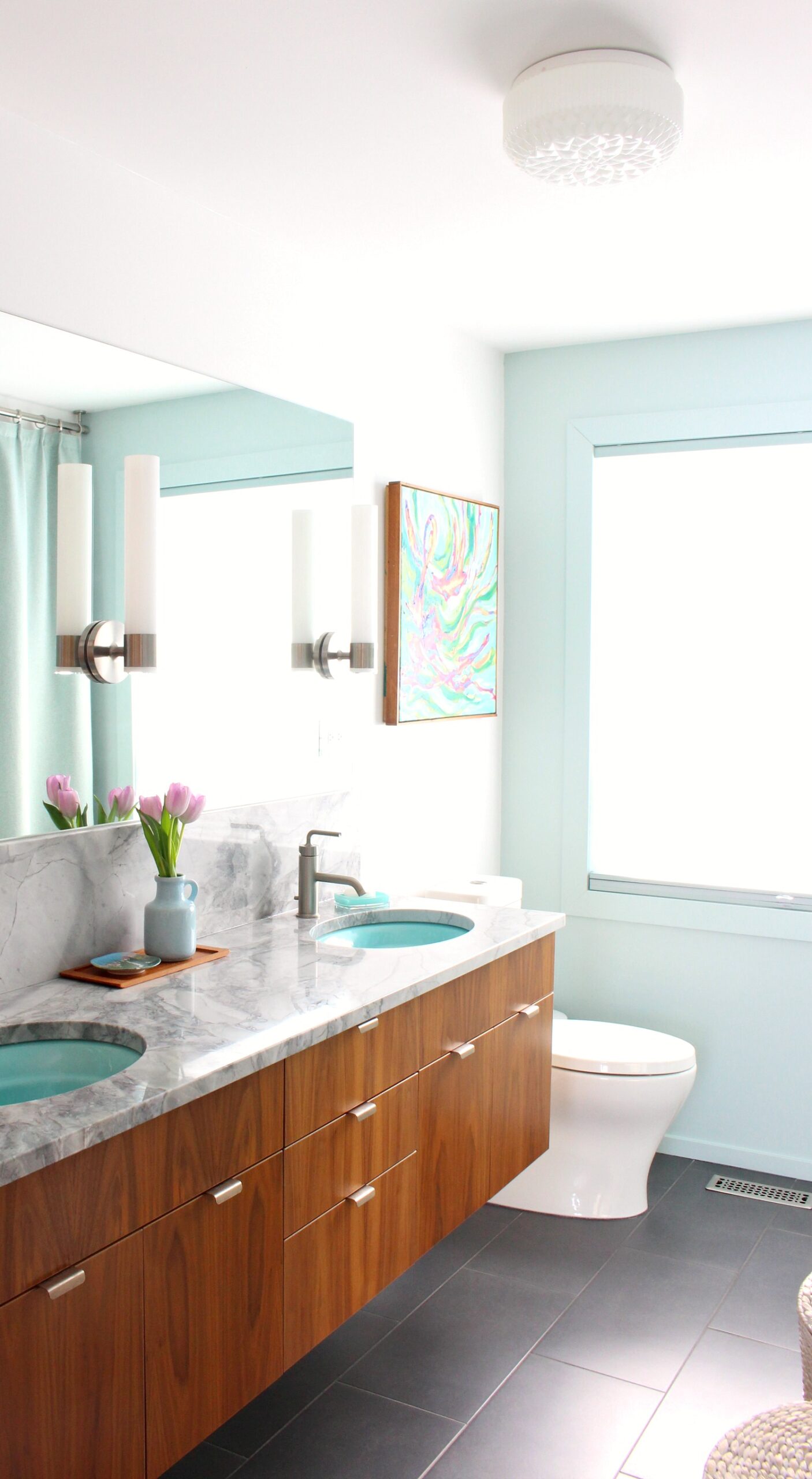 MCM inspired bathroom with aqua sinks