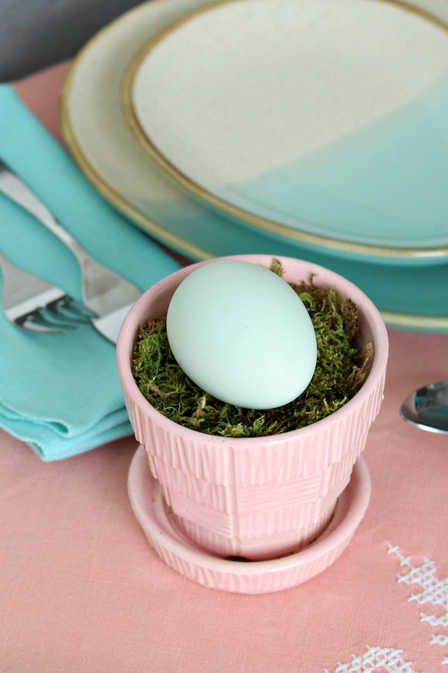 aqua egg in pink Mccoy pottery planter