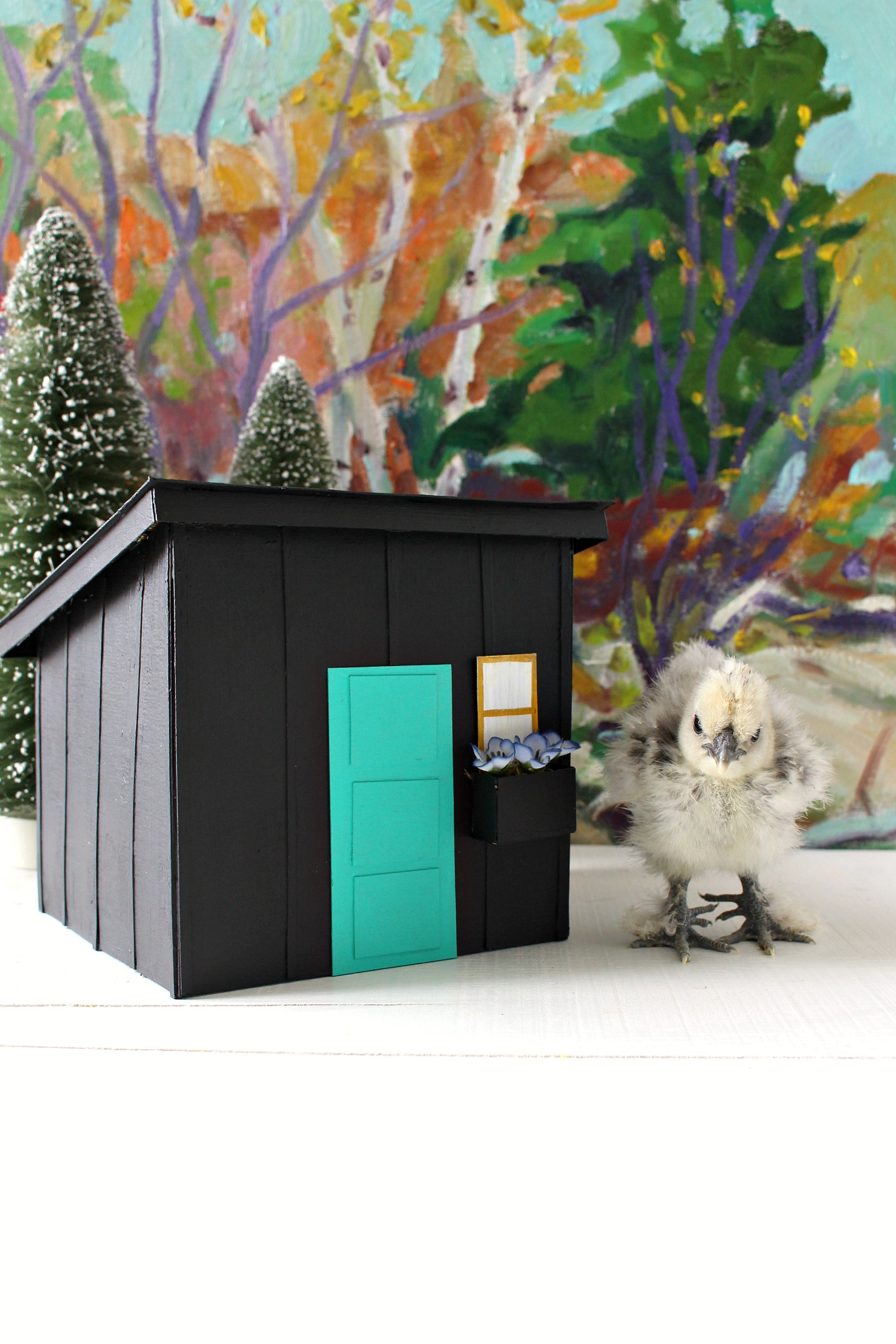 Chick with a Mini Replica of a Modern DIY Chicken Coop