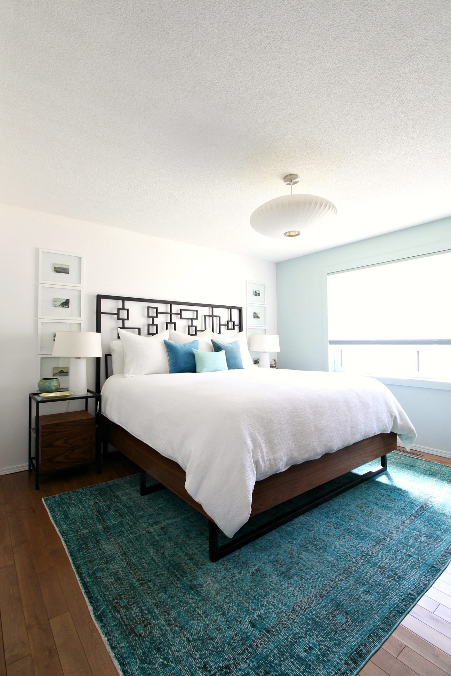 Coastal Bedroom with Overdyed Rug