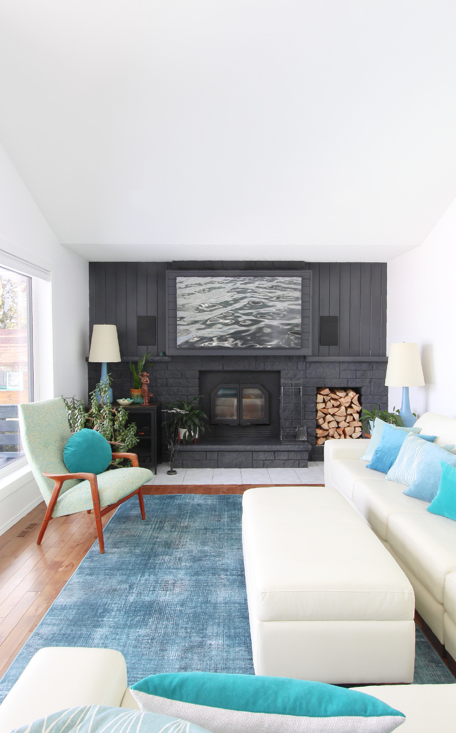 Lake House Living Room with Black Fireplace