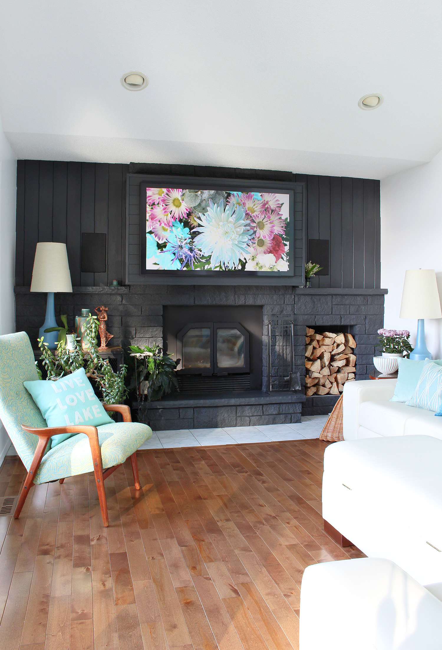 Lake House Fireplace Below a TV