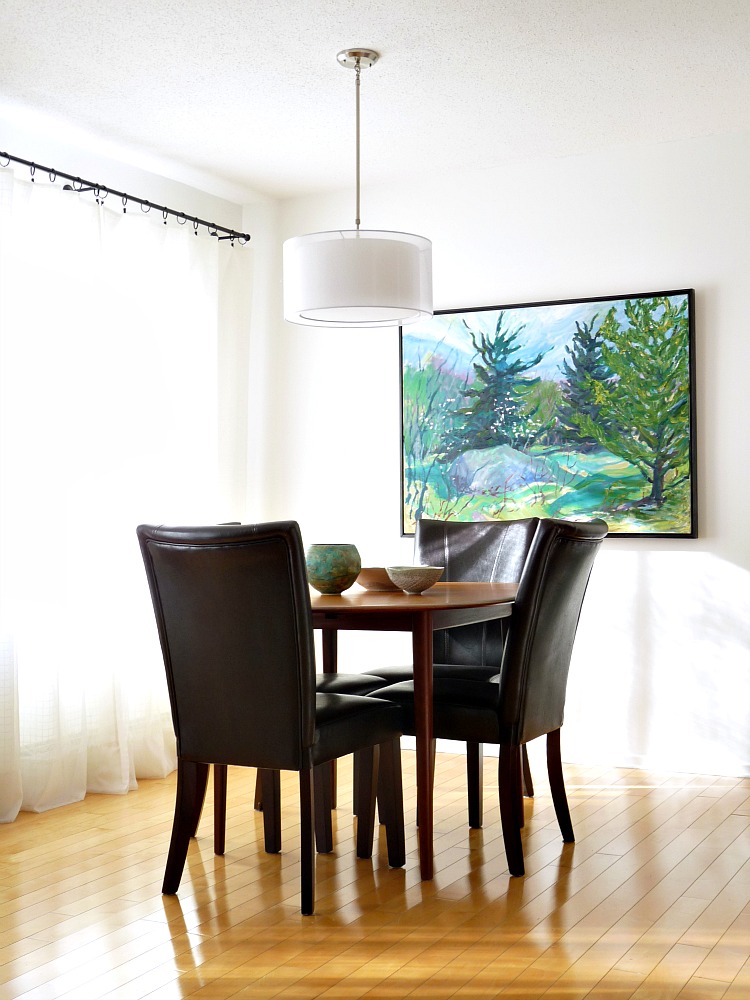 Minimalist Dining Room with Large Landscape