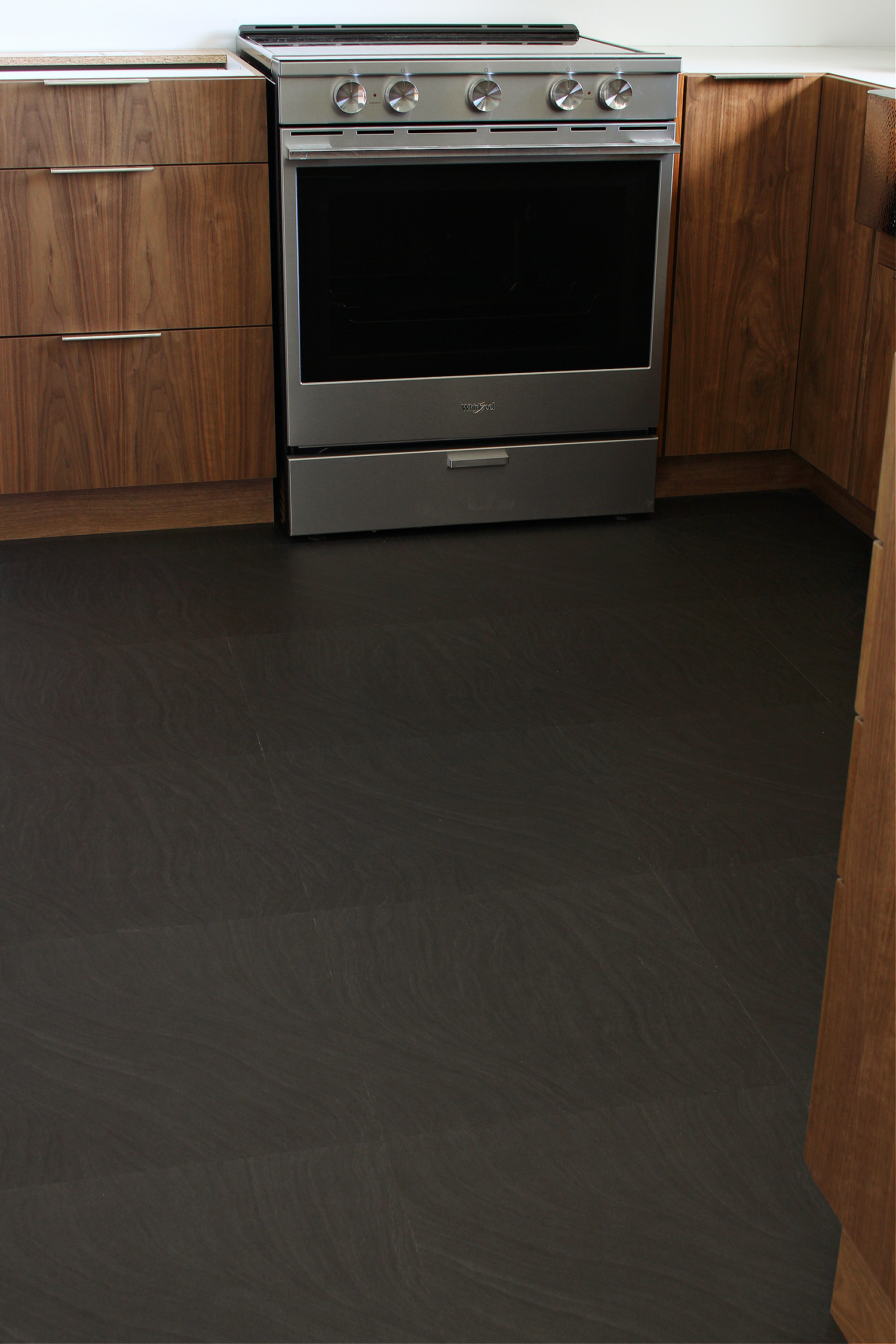 black luxury vinyl tile floor