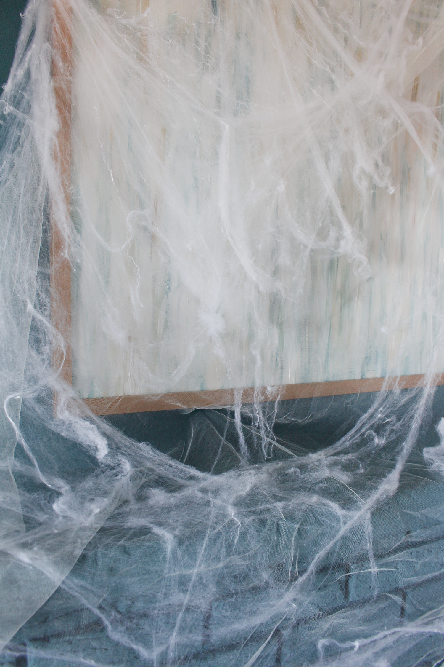 Fireplace Draped with Fake Cob Webs