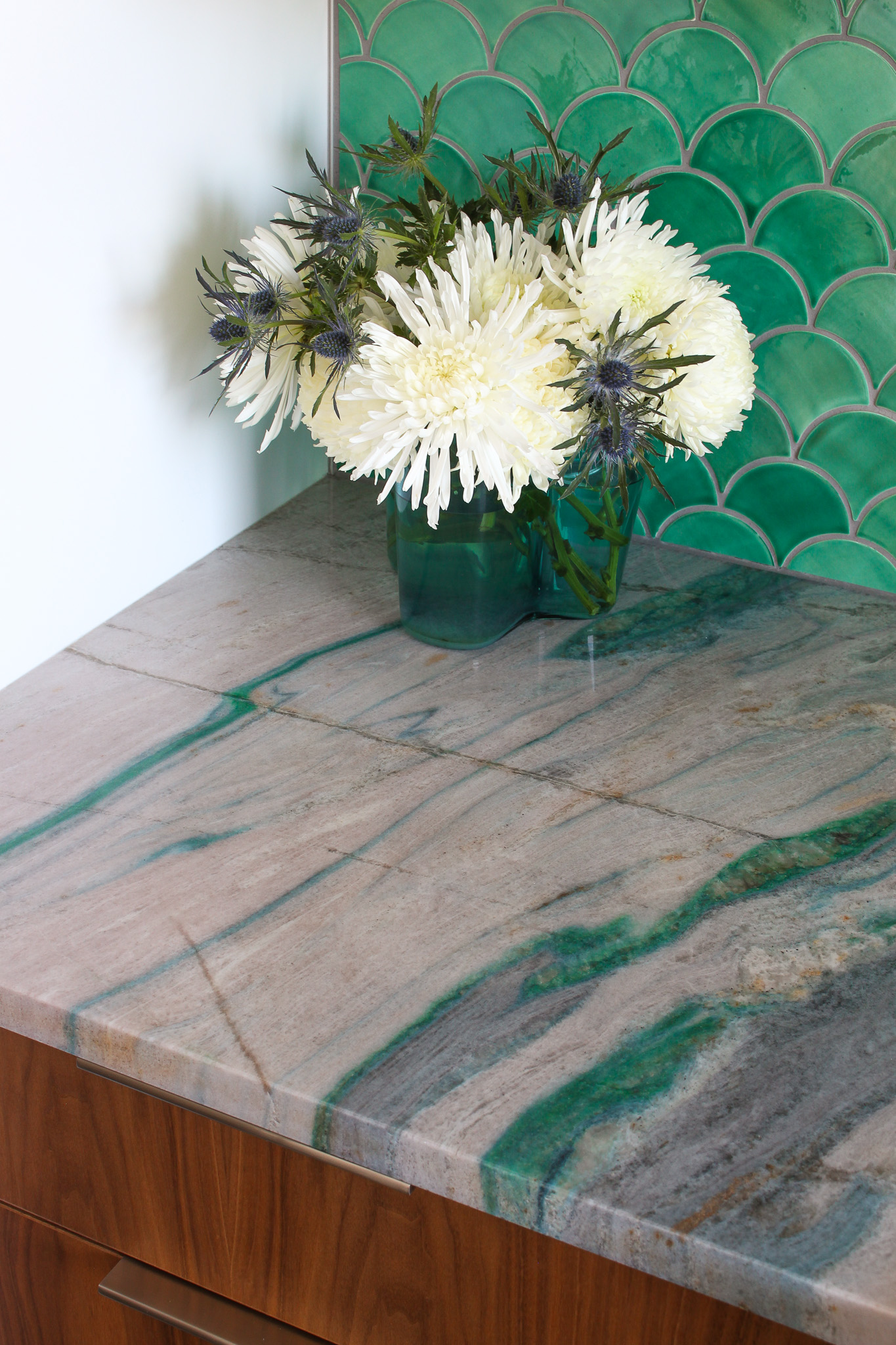 Colorful Kitchen Renovation with Blue Stone Counters and Green Tile Backsplash