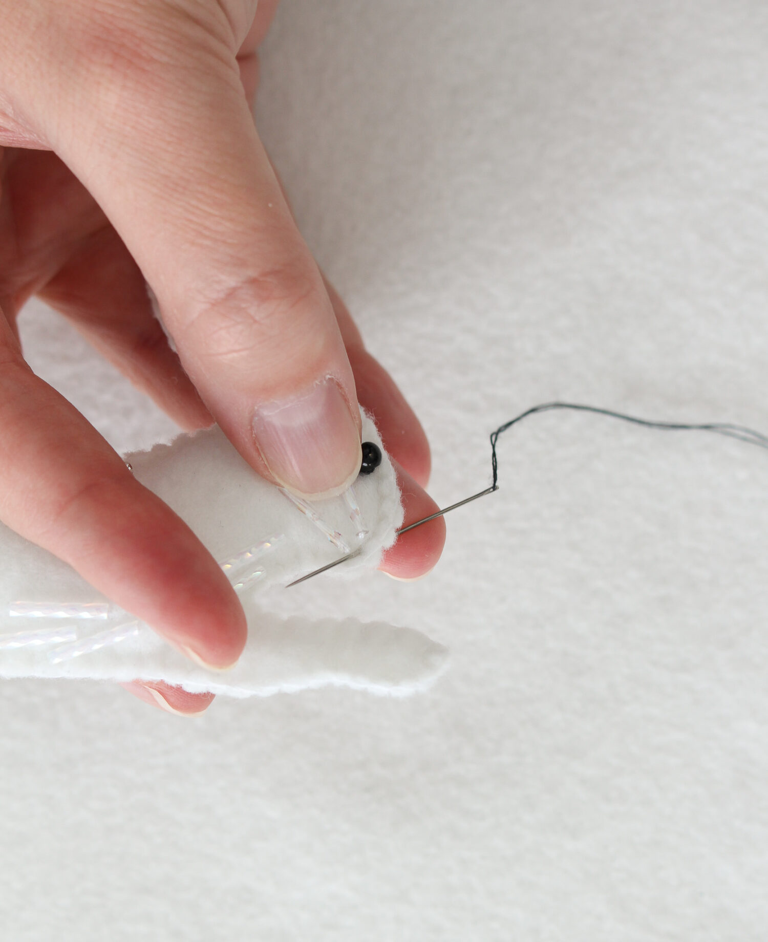 How to Stitch a Nose onto Felt Animal Ornaments