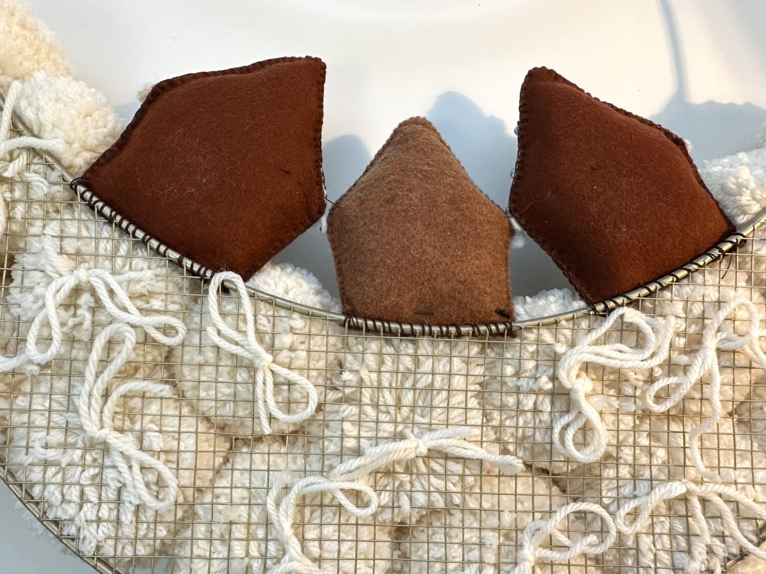 How to Sew Felt Ornaments onto a Wreath Form