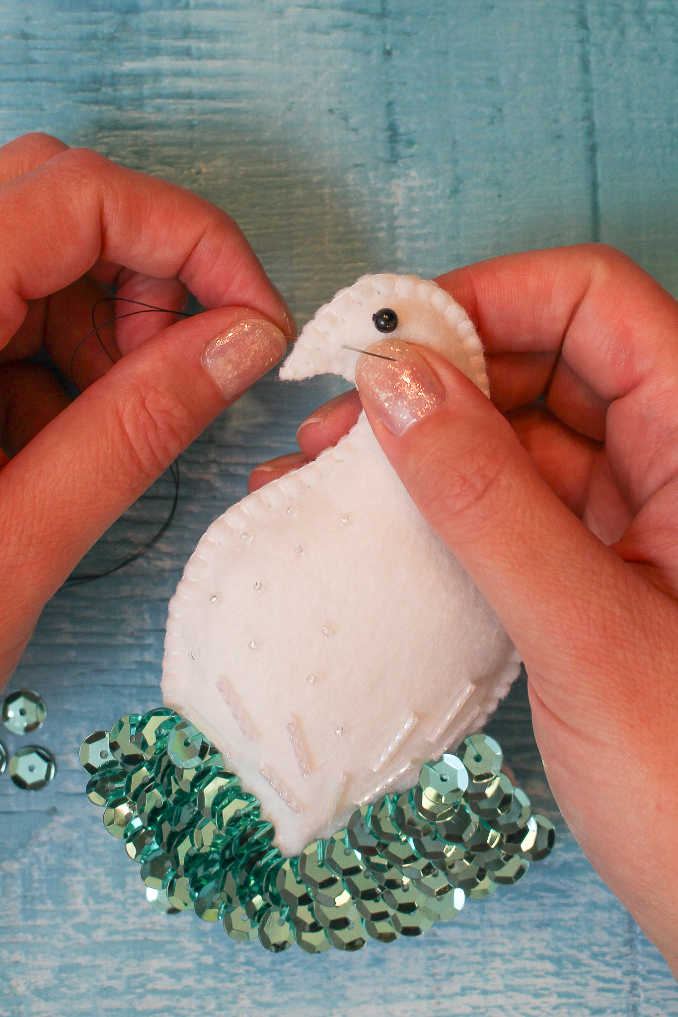 Stitch a Beak onto Felt Bird Ornament